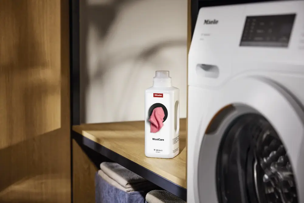 Средство для стирки деликатных тканей и изделий из шерсти WoolCare 1,5 литра фото 2
